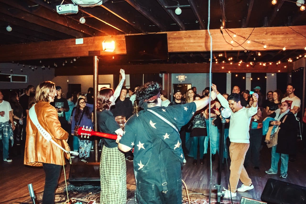 Band performing to a packed room